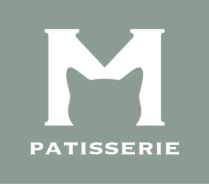 Cat Museum Istanbul Patisserie Logo featuring an 'M' design that resembles a cat's head